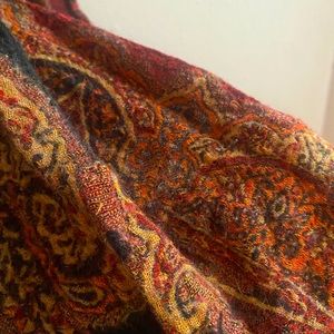 Gorgeous vintage pashmina scarf! Shades of black, red, orange, tan, and yellow.